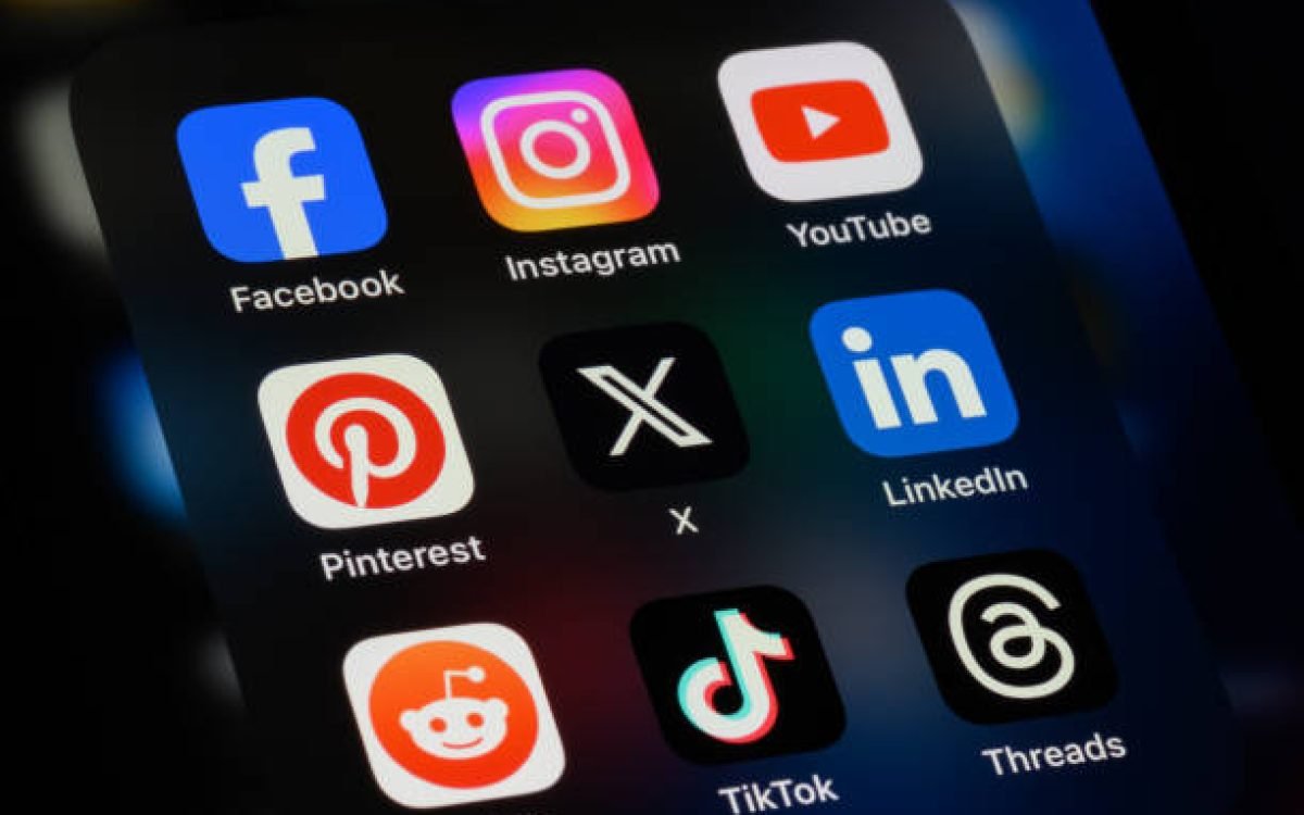 Toronto, Canada - September 24, 2023:  Popular social media apps on an Apple iPhone: Facebook, Instagram, YouTube, Pinterest, X (formerly Twitter), LinkedIn, Reddit, TikTok, and Threads.